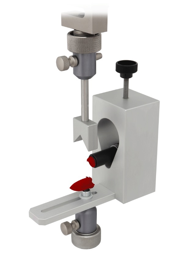 Lipstick Shear Fixture And Method